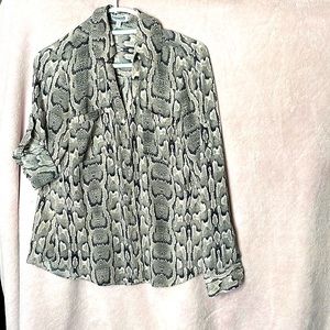 Used/ good condition, snake printing, pockets, buttons up, long sleeves!